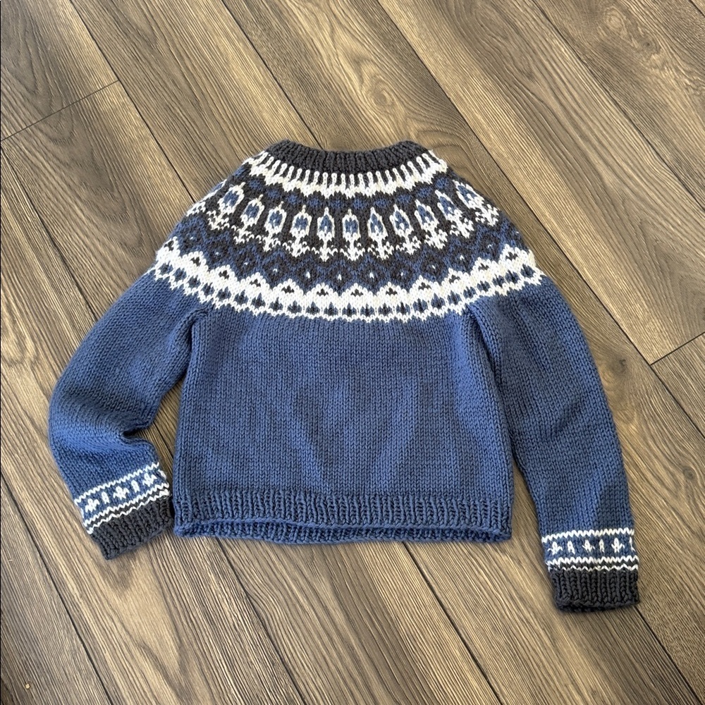 handmade blue Icelandic Lopapeysa sweater a traditional Fair Isle patterned yoke